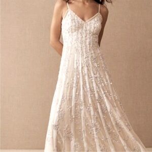 NEEDLE AND THREAD long, sequin gown.